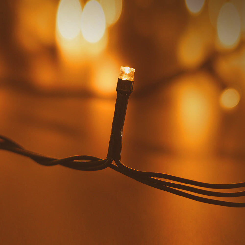 Modee Guirlande Lumineuse LED de Noël 100LED 10m Blanc Chaud 2550K IP44 Fil Vert avec Prise Adaptateur